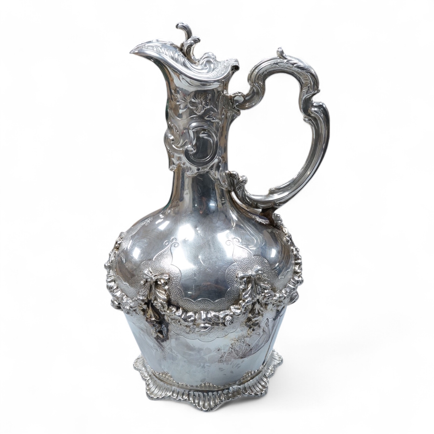 A continental white metal (stamped 0.925) ewer, decorated with floral garlands, height 28cm, 25.4oz.